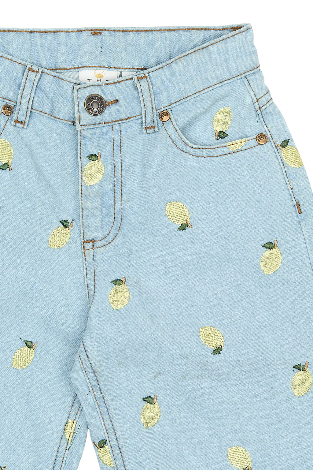 Weite geschnittene Kinderjeans mit aufgestickten Zitronen, Detailansicht